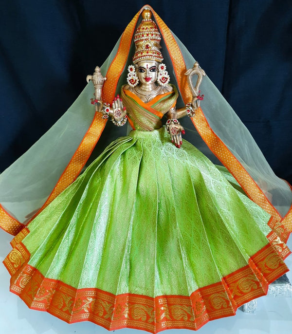 Deity half saree / lehenga patka made of Brocade Silk fabric (Not Pure Silk) - Pastle green Lehenga with orange jari border and golden net dupatta