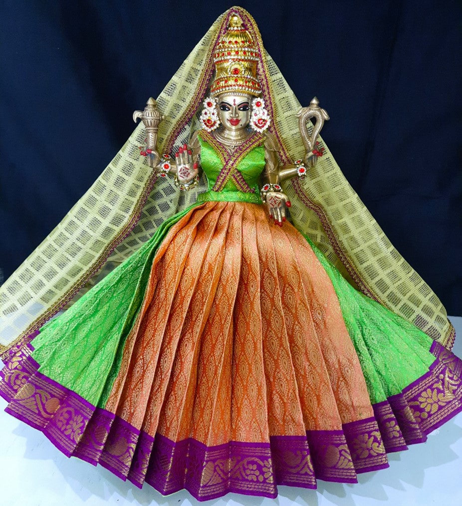 Deity half saree / lehenga patka made of Brocade Silk fabric (Not Pure Silk) - Pastle green and peach Lehenga with purple jari border and golden net dupatta 1