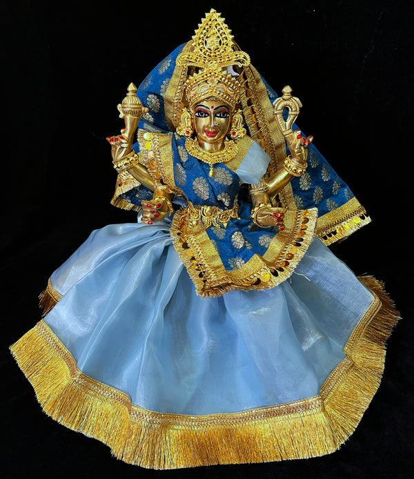 Deity half saree / Lehenga patka made of Gimmi Choo Monocrome fabric - Ice Blue Lehenga and Blouse with Gold Kiran Lace and Indigo Dupatta