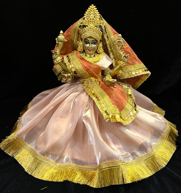Deity half saree / Lehenga patka made of Gimmi Choo Monocrome fabric - Metallic Peach Lehenga and Blouse with Gold Kiran Lace and Orange Dupatta