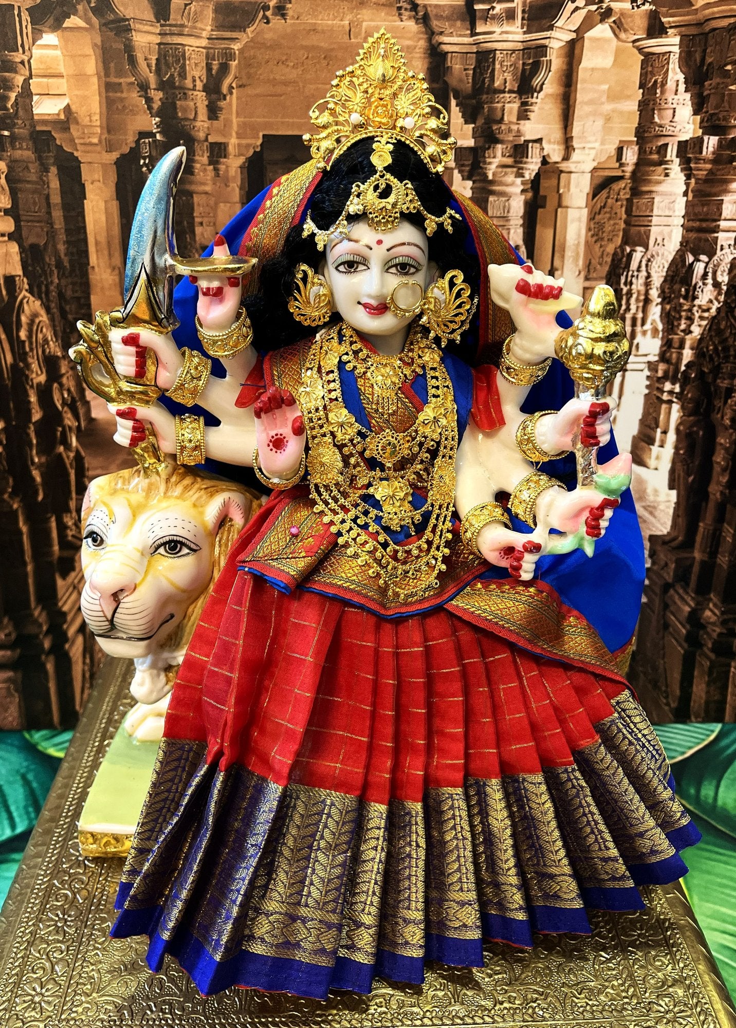 Deity half saree / lehenga patka made of Checks Organza Saree (Not Pure Silk) - Red Lehenga with Royal Blue  running zari border and Royal Blue plain silk dupatta with red zari border 1