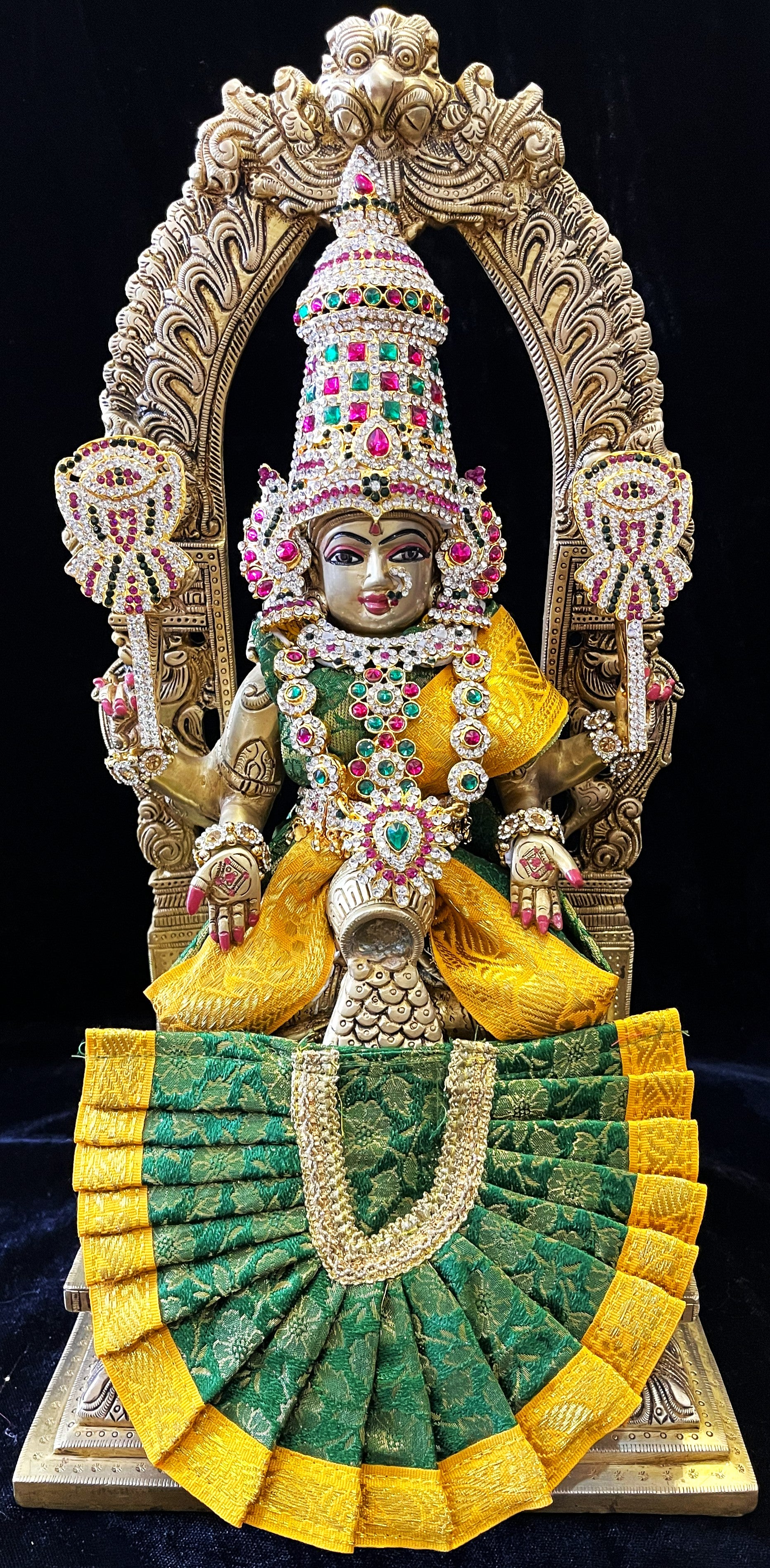 Deity Kamakshi Saree made of Brocade Silk (Not Pure Silk) - Bottle Green Saree with Yellow Border, Bottle Green Blouse and Bottle Green Fan 1
