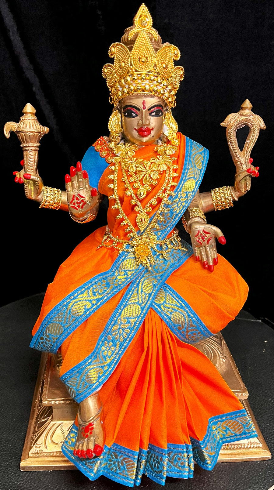 Deity Unstitched Meenakshi Saree made of Plain Silk (Not Pure Silk) - Orange Saree with Sky Blue border and Sky Blue blouse