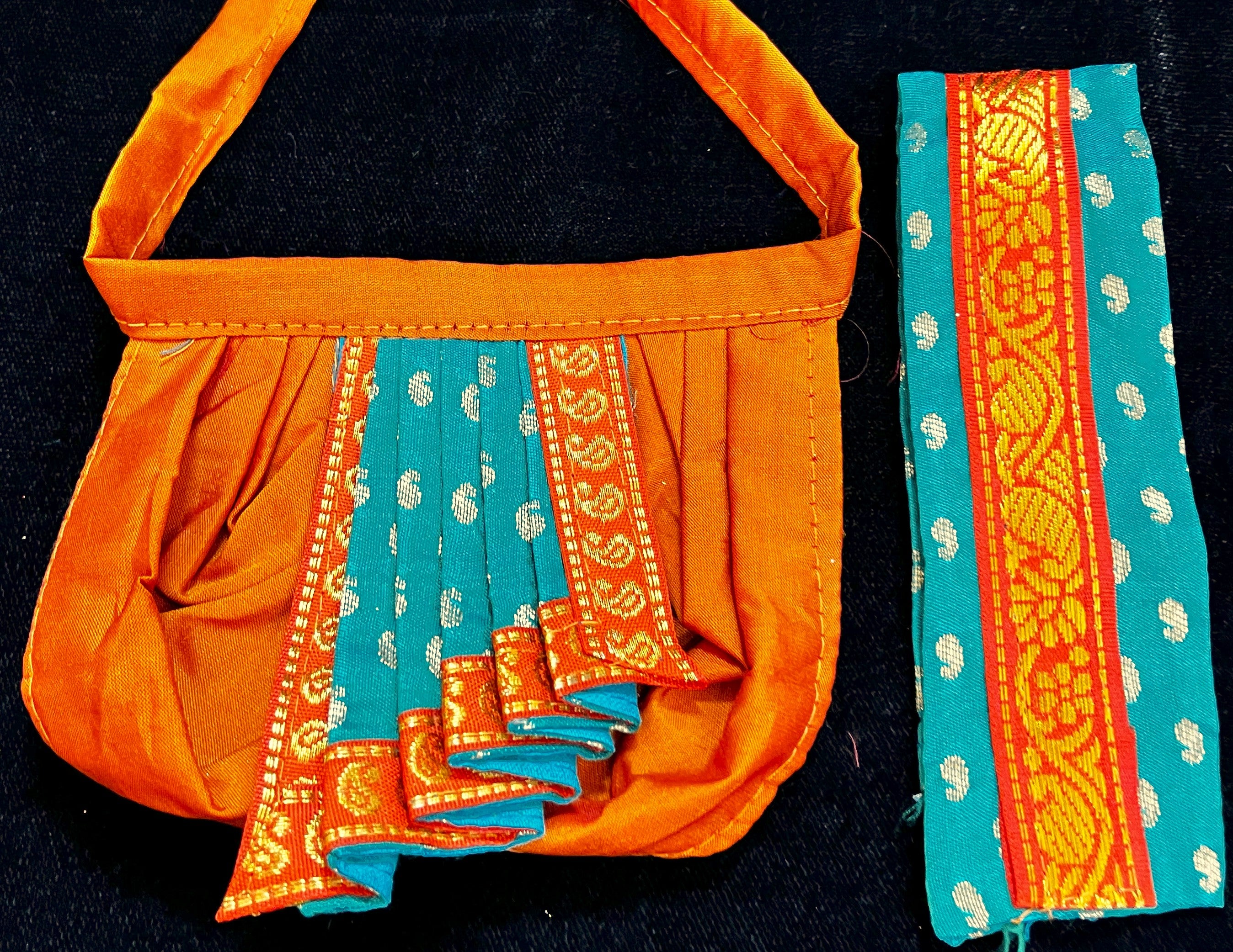 God Idol Dress – Dhoti, Bhgavan dress, Deity dhoti patka/shalya, Khes, Patka, Uparna Vastra for Ganpati, Krishna, Balaji, Murugan, Isar Ji | Gangaur, made of Kanchivaram Pure Silk material - Orange colour dhoti with Green Border and Teal colour Shalya