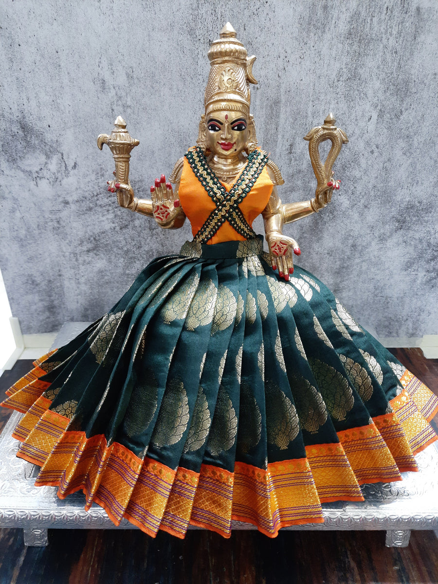 Deity Lehenga  / Lehenga patka made of Tapeta Big Butta Silk Lehenga  (Not Pure Silk) - Bottle Green Lehenga with Orange Border and  Orange Blouse