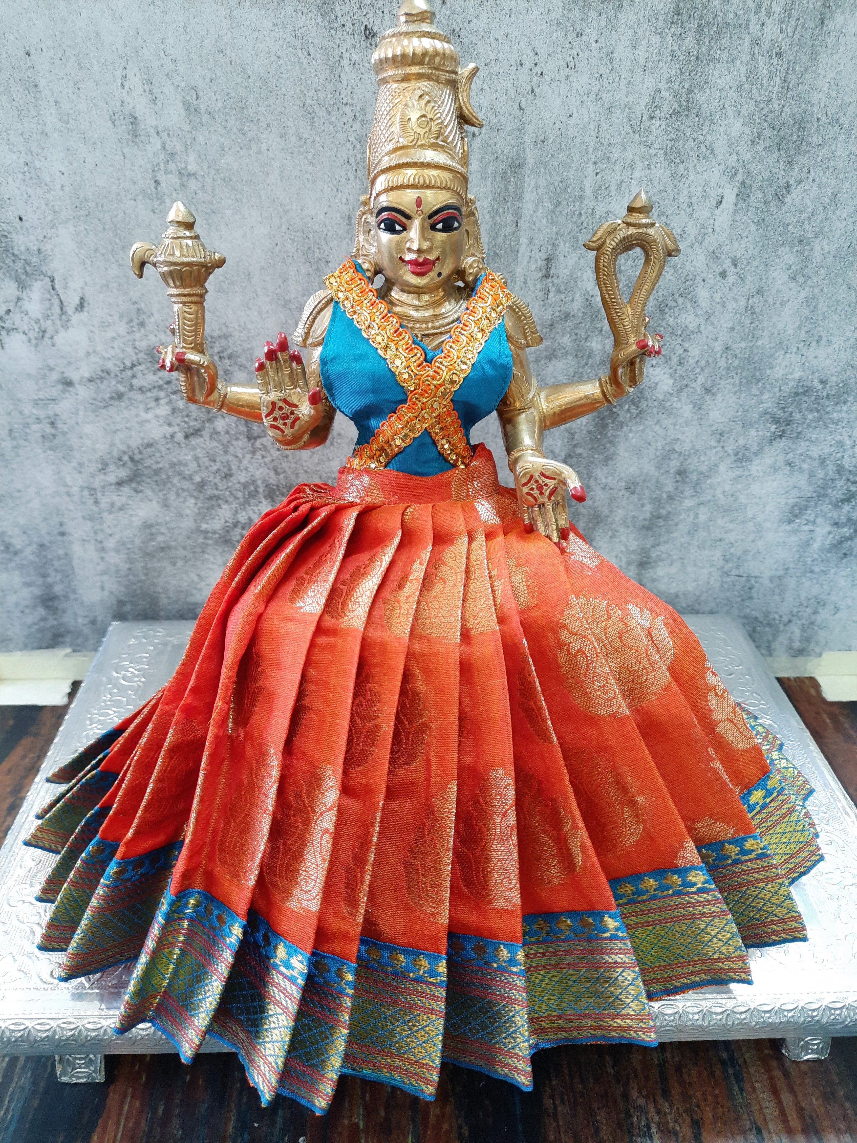 Deity Lehenga  / Lehenga patka made of Tapeta Big Butta Silk Lehenga  (Not Pure Silk) - Orange Lehenga with Sky Blue Border and Sky Blue Blouse 1