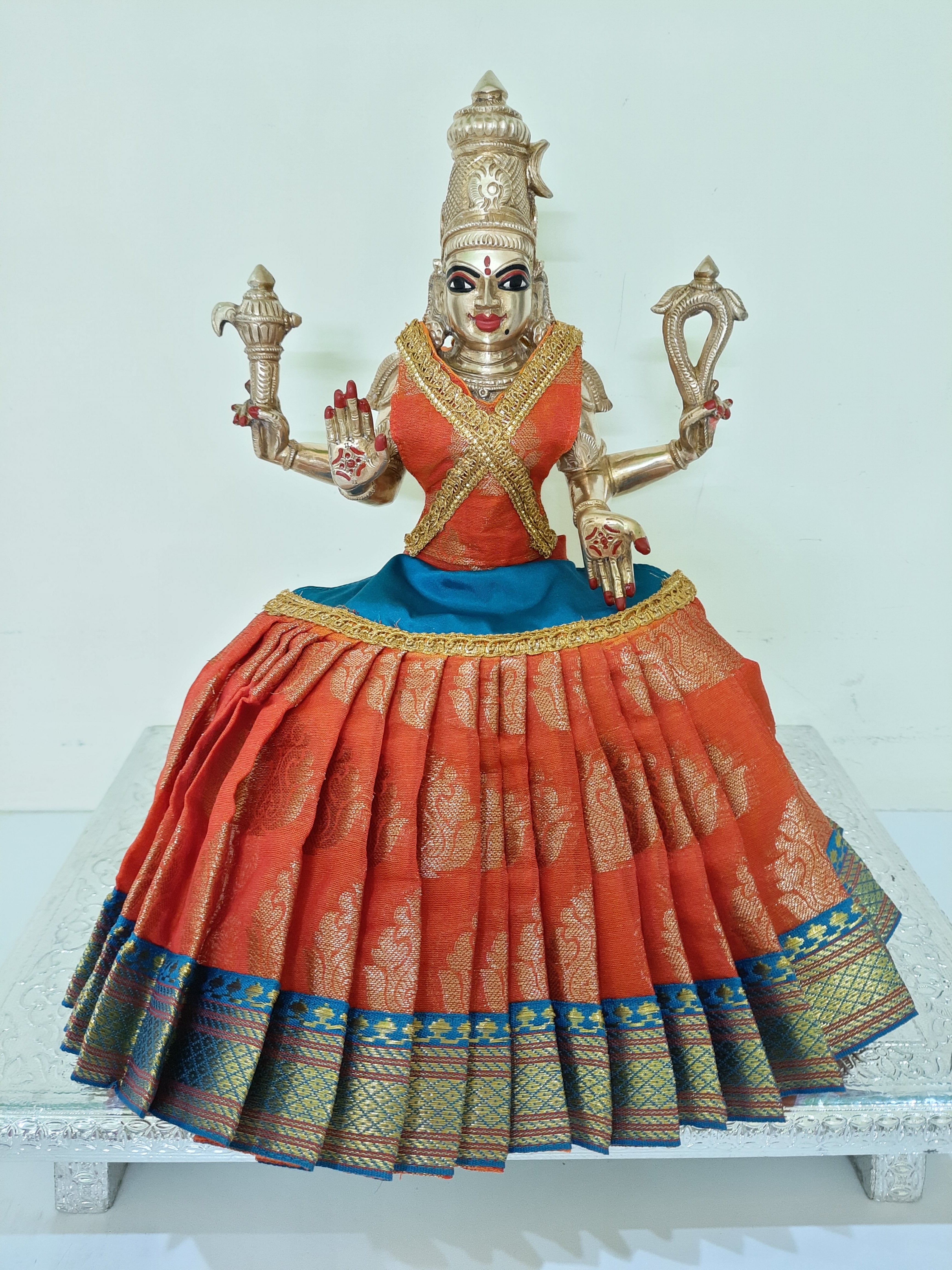 Deity Lehenga  / Lehenga patka made of Tapeta Big Butta Silk Lehenga  (Not Pure Silk) - Orange and Sky Blue Lehenga with Sky Blue Border and Orange Blouse 1
