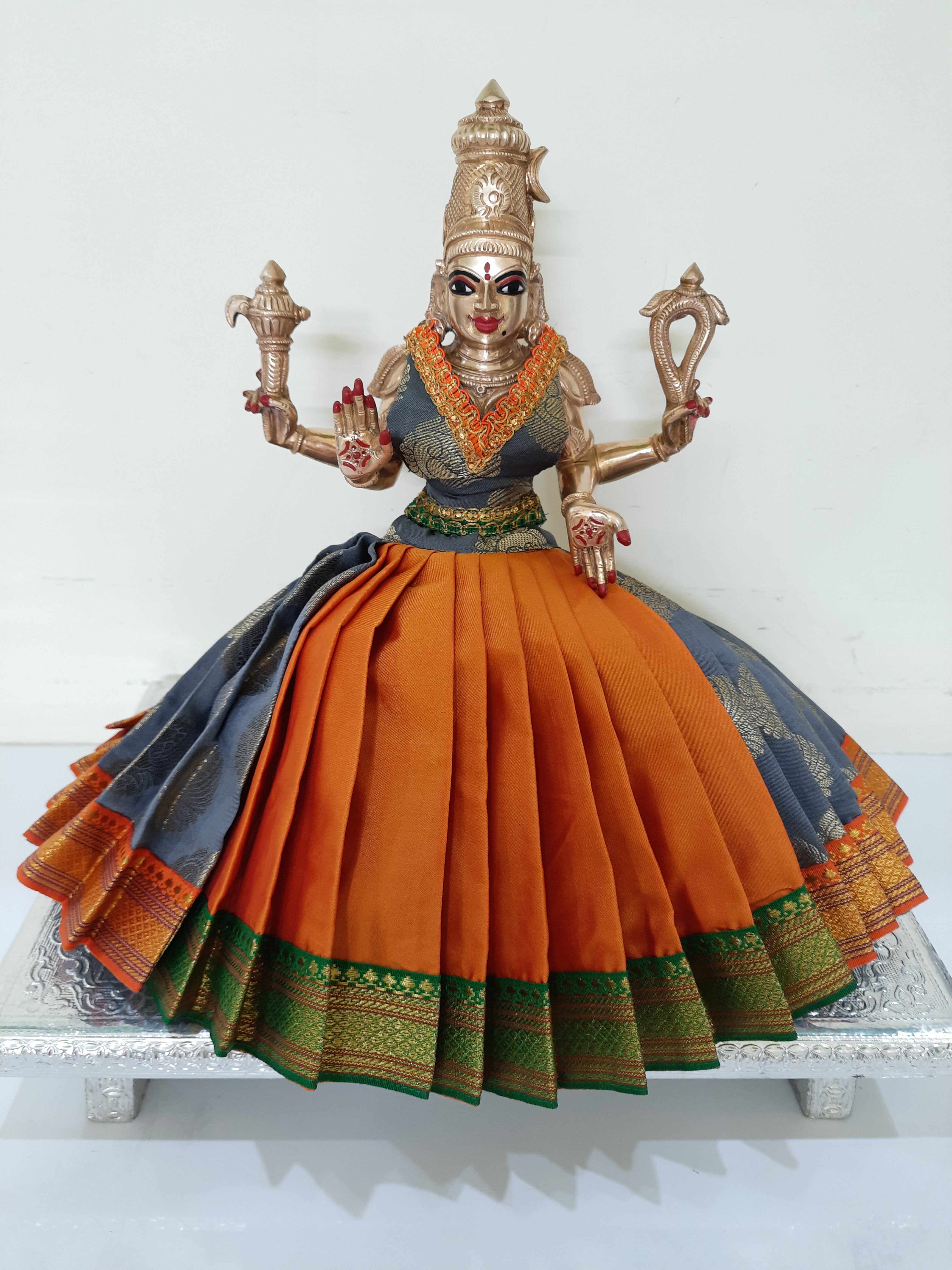 Deity Lehenga  / Lehenga patka made of Tapeta Big Butta Silk Lehenga  (Not Pure Silk) - Orange and Grey Lehenga with Green and Orange Border and Grey Blouse 1