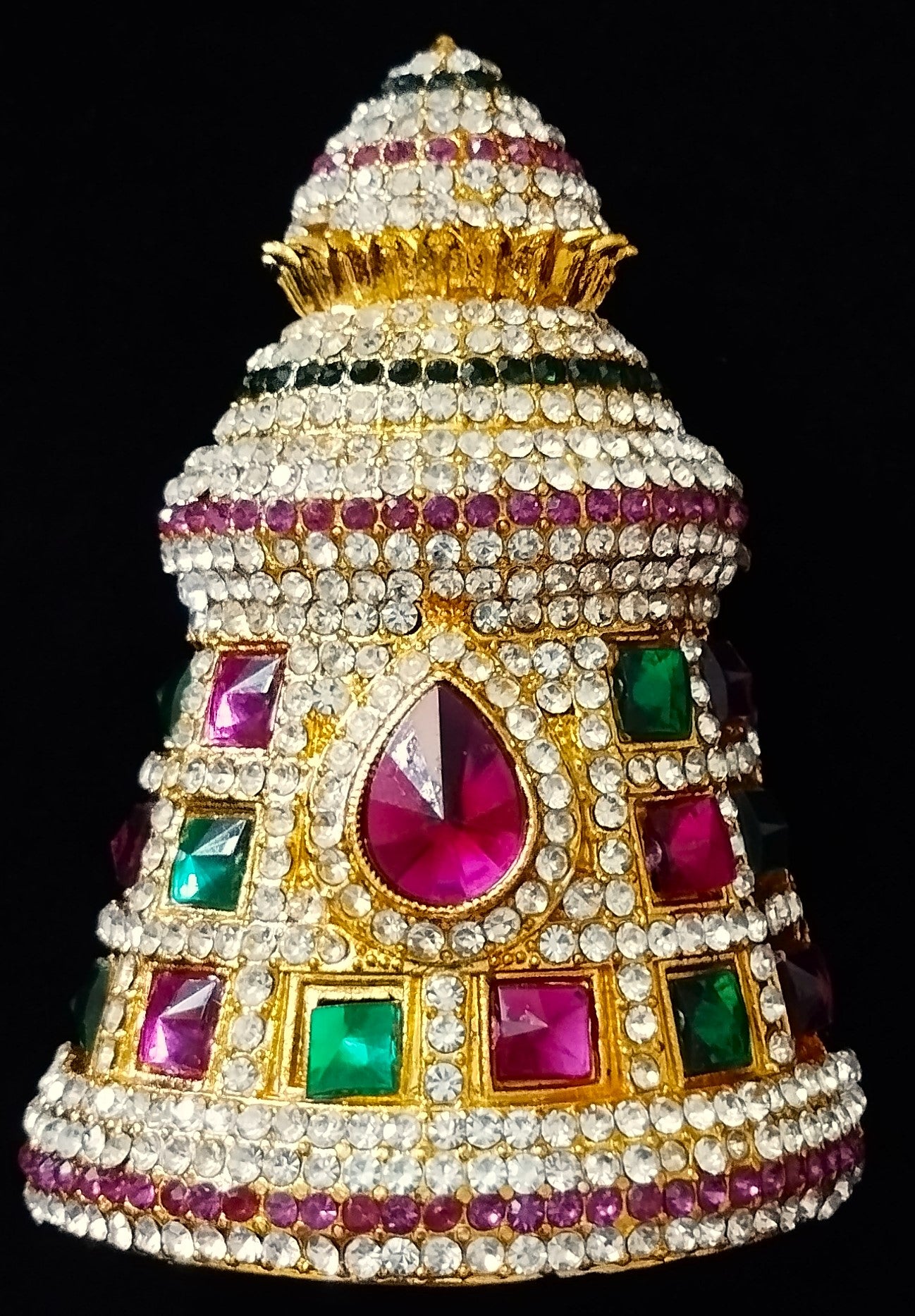 Traditional South Indian Stone-Studded Crown (Kireedam) - Red & White stones / Red, white, & green stones / Pink & White stones/ Pink, white & Green stones on gold plated metal alloy - Length: 3.5 inches, Width: 3.5 inches 3